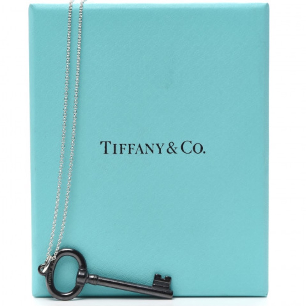 Tiffany’s titanium black oval key silver chain